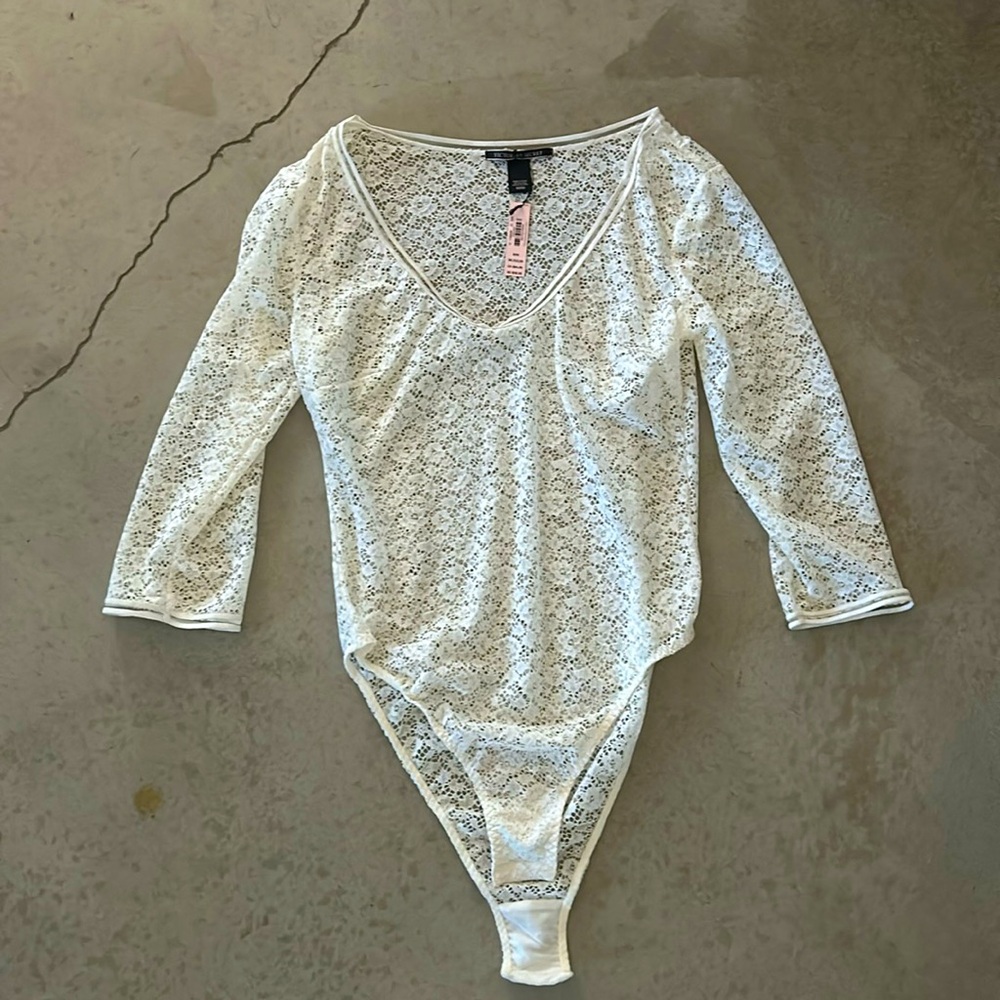 White body suit.